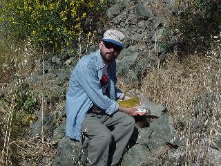 John logging the find.