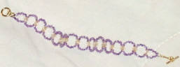 Click for Larger View (both Purple Bracelets)