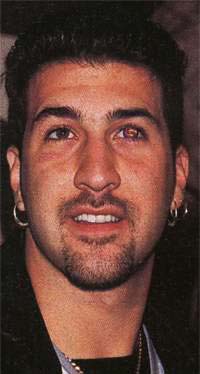 Look closely at his eye...It's a superman logo!!!