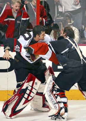 Esche and Lalime go at it in an all out Braw in the 3rd, all in all 15 players were ejected from the game and a new record was set @ 419 PIM in a game 