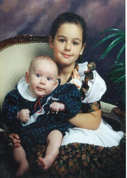 This is Chanel aged 5 years holding emilio aged 6 months.