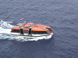 Lifeboat used as tender into Half Moon Cay, Bahamas.