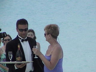 Is Dee after the champagne or the waiter?&nbsp; Naw just a picture with him