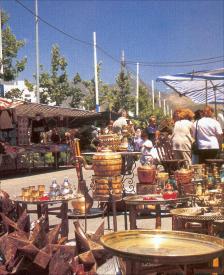 Stalls selling fresh fruit & vegs, plus many other products.