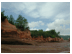 Another view of the red, sculptured shore