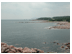 At ground level you can see one of the typical rocky shores of the area