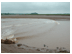 The tidal bore, caused by the shape of the Bay of Fundy and the strength of the incoming tide rolling in on top of the outgoing tributaries