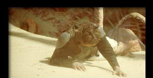 [ Sarlacc tentacle gripping Lando ]