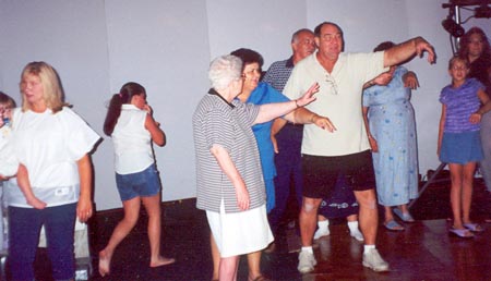 Tona, Grandma, Jeff's Mom and Dad doing a little hokey pokey