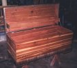 The lid up showing the cedar interior.