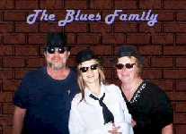 My dad has really gotten into the Blues Brothers.  This is the latest family photo!