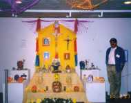 Seeing the photo in color really gives you a better idea of just how vivid everything is. That is Jose at right. He also did demonstrations of papel picado, paper cutting. He makes his own tools and cuts through about 30 sheets of tissue paper at a time, creating beautiful designs.