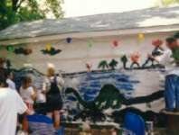We had fun at my high school grad party.  Yup, they painted a dinosaur mural on our garage!  Hehehe!