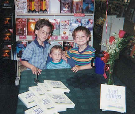 Photograph of Oliver boys at Mom's book-signing