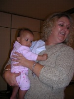 At Heathrow, holding Bryanna