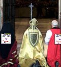 The Archbishop and a Patriarch's Representative don Special JAF Prayer Wear. JAF Systems is still in conversation with the Pope's fashion consultants.