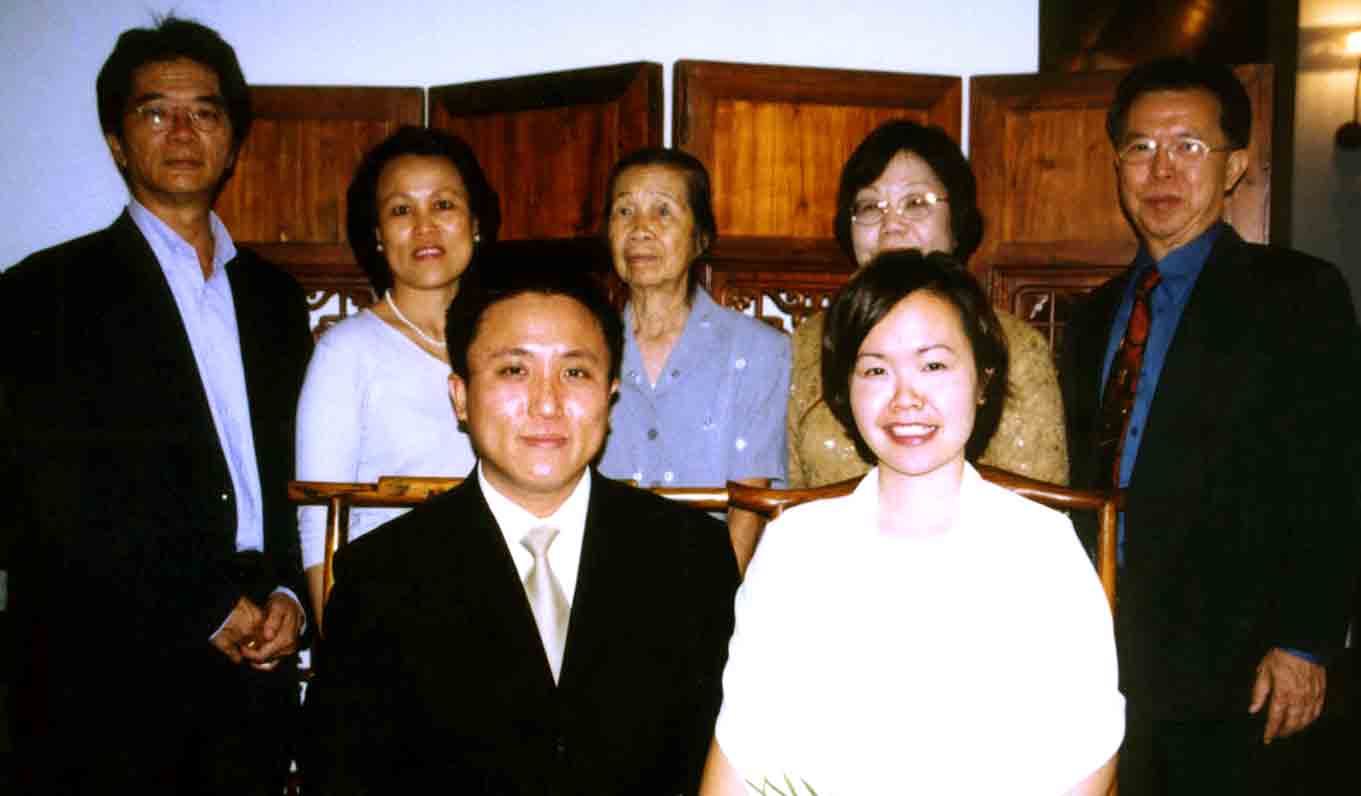 Back row: dad, mum, me grandma (looking at the wrong camera), joyce's ma, and pa.