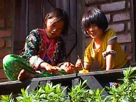 karen kids in traditional colourful garb