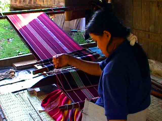 hand-operated loom; leg -powered rice mortar