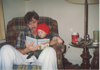 Mitchel teaching dad to read!