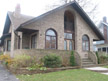 Front of house with balcony arch