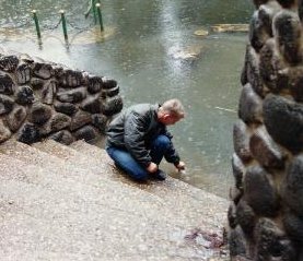 Me getting a water sample from the Historic, Jordan River, Israel