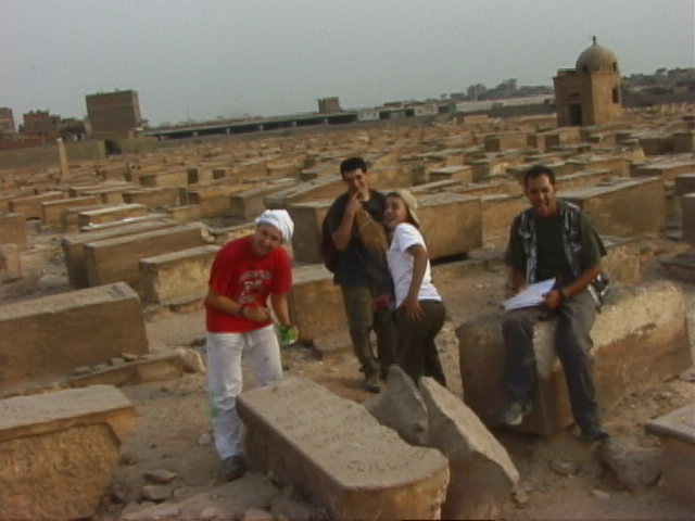 Erin Coryell, Anthony Zamlich, Jack Rosen's Butt, and Aaron Kiviat documenting graves.