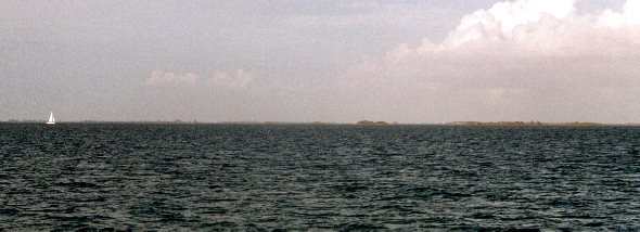 Sloop, a mile astern.