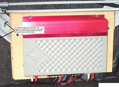 I bolted the amp to some MDF board and mounted it to the factory trunk brace.