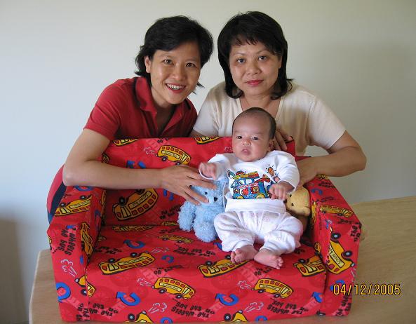 With Mum & Grandma on his own sofa
