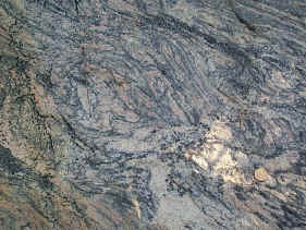 000717ag Detail of metamorphics in outcrop just west of 000717ae.jpg (186623 bytes)
