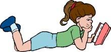a girl laying on the floor reading