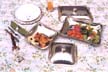 Table with dishes for vegetables