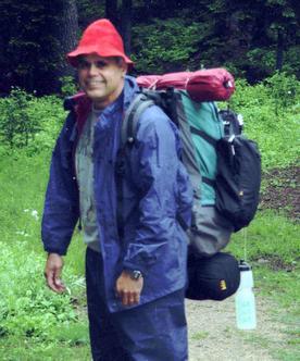 Jim leaving Rainy Pass in the rain and heading north. Aug 15, 99