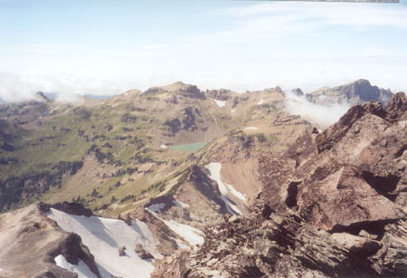 View to the west from Old Snowy. The highest point on the PCT in Washington. Goat Lake in the distance.