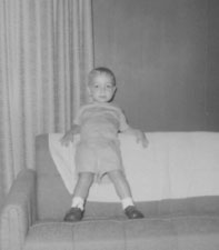 Jim poses on couch