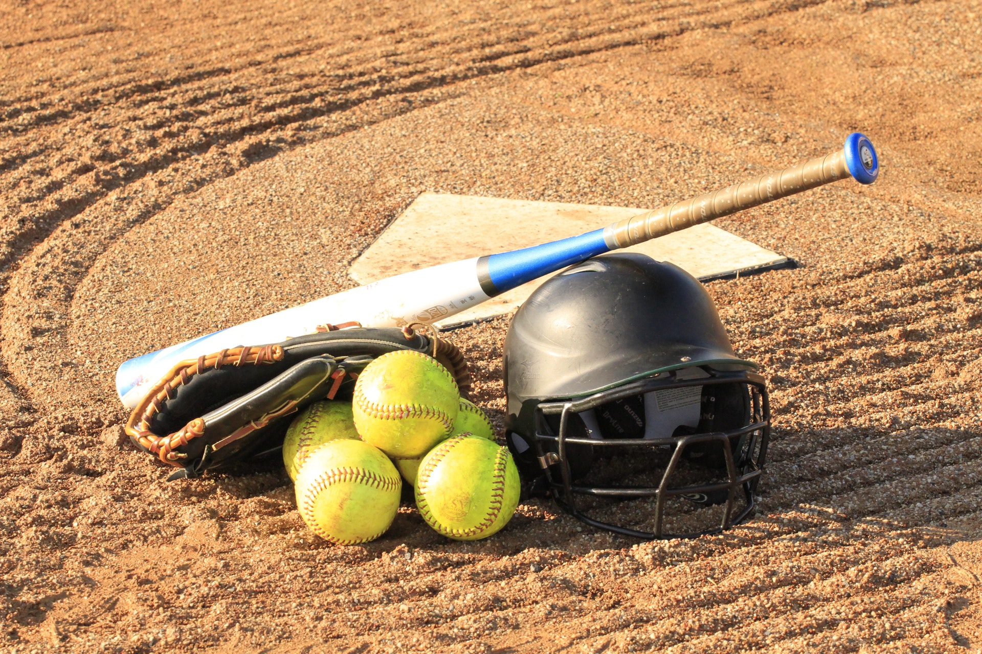 Baseball Gear on the ground by home plate