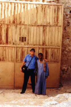 The writer with a friendly Egyptian guard at the entrance to tomb No. 25 at Tell el Amarna