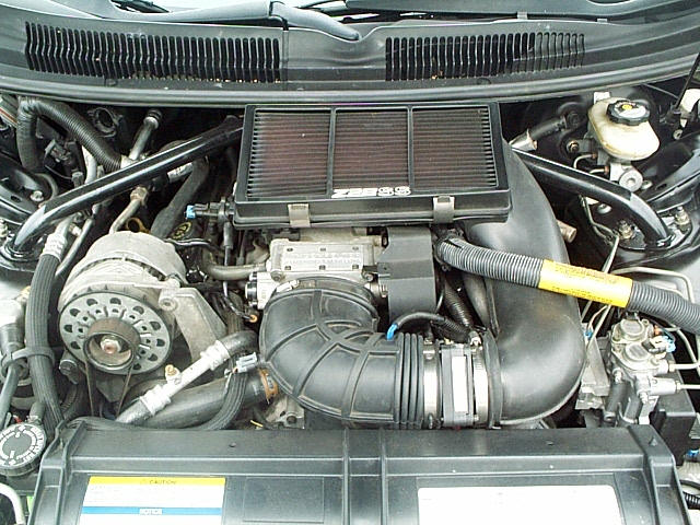 "Yeah, its all stock, except for the filter and headers...got a nasty vaccum leak, too, you'll have to give me the move"