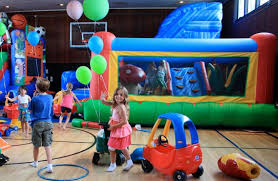 Picture of party with bouncy house