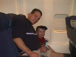 Joe and Bailey on a plane
