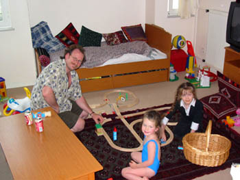 I took this picture May 2nd, 2004.&nbsp; Sean and I had just rearranged the livingroom the night before. Liam was napping so Dante broke the trains out!