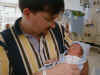 JP's first time holding Nate  (58459 bytes)