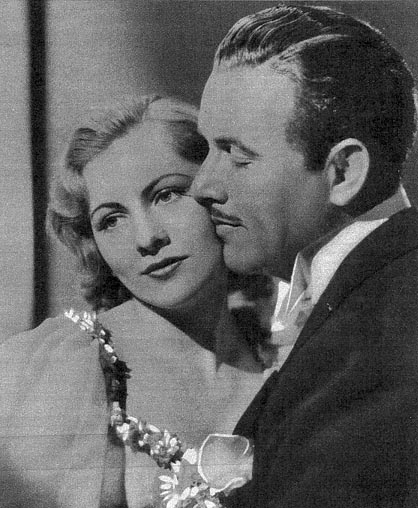 Joan Fontaine and Preston Foster