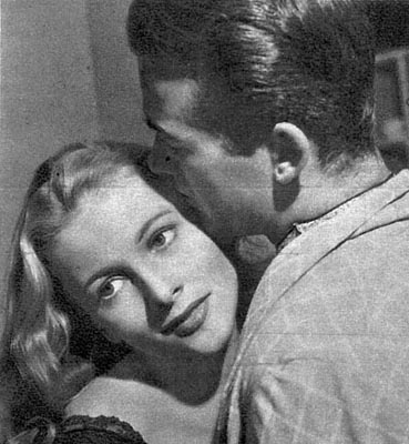 Joan Fontaine and Mark Stevens.  Image scanned from magazine page, source unknown