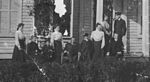 Hi Resolution Closeup � Laura Nickel and F.I.S. with family group in front of house, probably Blandinsville, Illinois