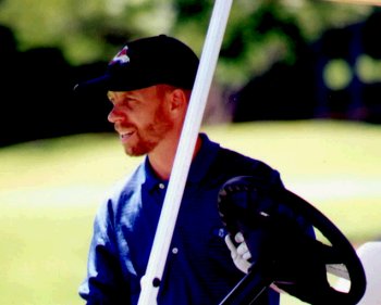Scott in golf cart