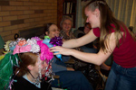 Jannie crowning me (Mom and Grandma in the background)