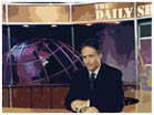 Jon Stewart at desk.&nbsp; This image is in a "artistic" media, not photo taken quailty.