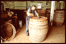 Man labelling barrel